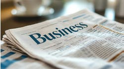 Newspaper showing the business section Newspaper showing the business section