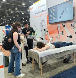 RealMan Healthcare Robot massaging an attendee at the Automate 2025 show. RealMan Healthcare Robot massaging an attendee at the Automate 2025 show.
