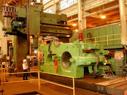 ACE worker doing an installation at a factory ACE worker doing an installation at a factory