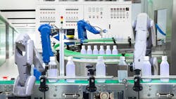 Robotic arm holding water bottles on production line in factory, Industry 4. 0 concept Robotic arm holding water bottles on production line in factory, Industry 4. 0 concept