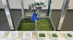 Chef Robotics Food Assembly Robot close-up on end effector handling food