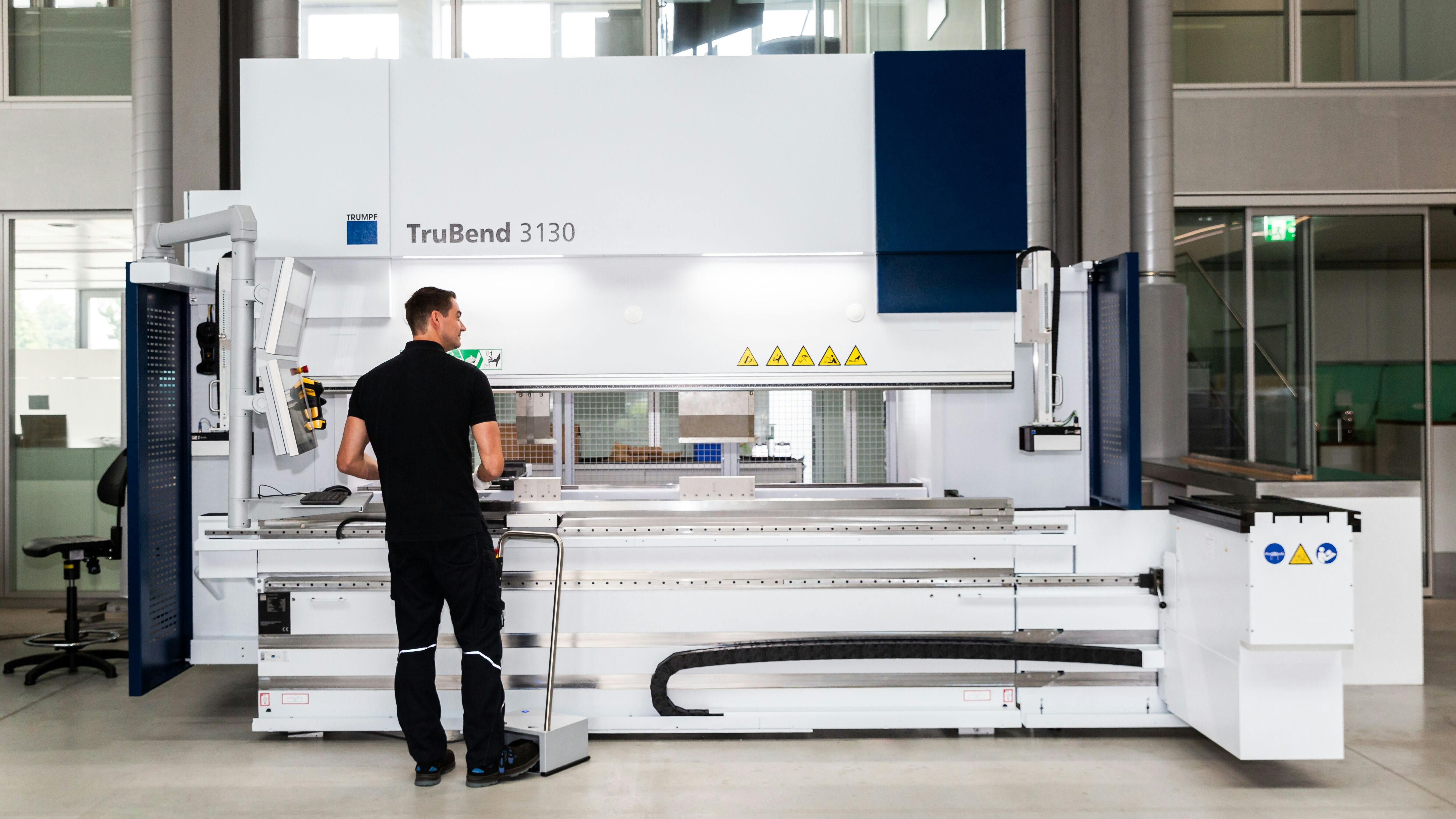 TruBend 3000 press brake bending machine with worker - full view