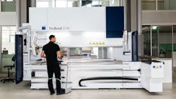 TruBend 3000 press brake bending machine with worker - full view TruBend 3000 press brake bending machine with worker - full view