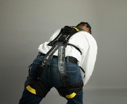 HeroWear exosuit on worker bending over HeroWear exosuit on worker bending over