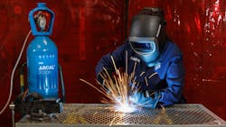 Woman welder wearing new Radnor FR clothing Woman welder wearing new Radnor FR clothing