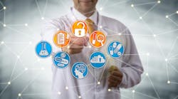 Manufacturer assessing drug discovery data. Manufacturer assessing drug discovery data.