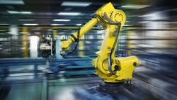 Robots work in a workshop Robots work in a workshop