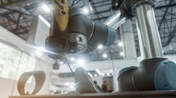 UR robot polishing a metal component UR robot polishing a metal component